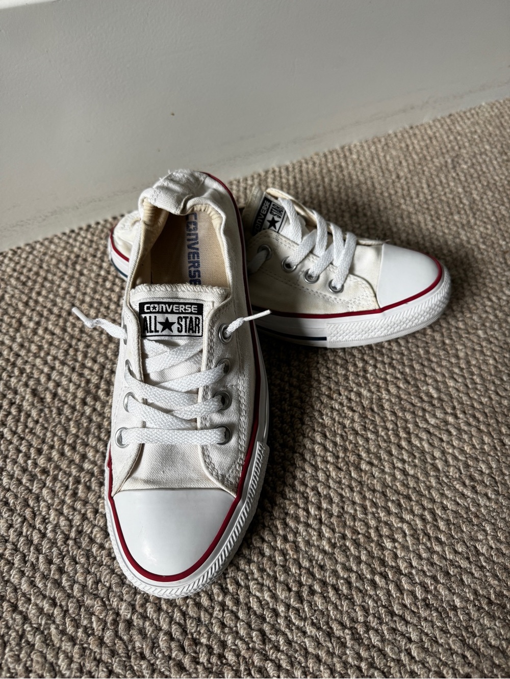 Converse Women’s White Low Top slip-on Sneakers with Red Trim & stretchy heel